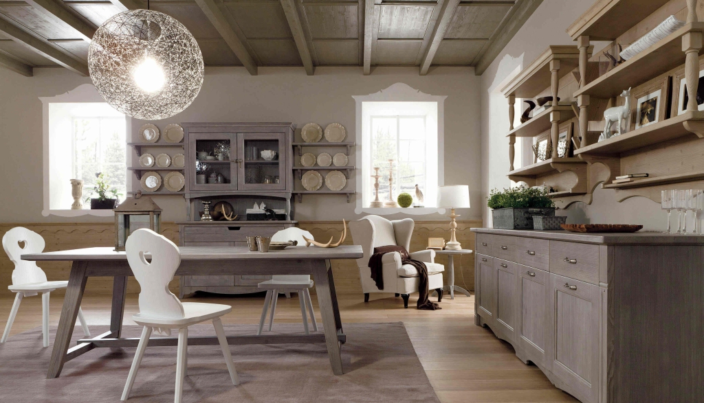 Sala da pranzo composta da vetrina, tavolo e credenza finitura bianco lucido